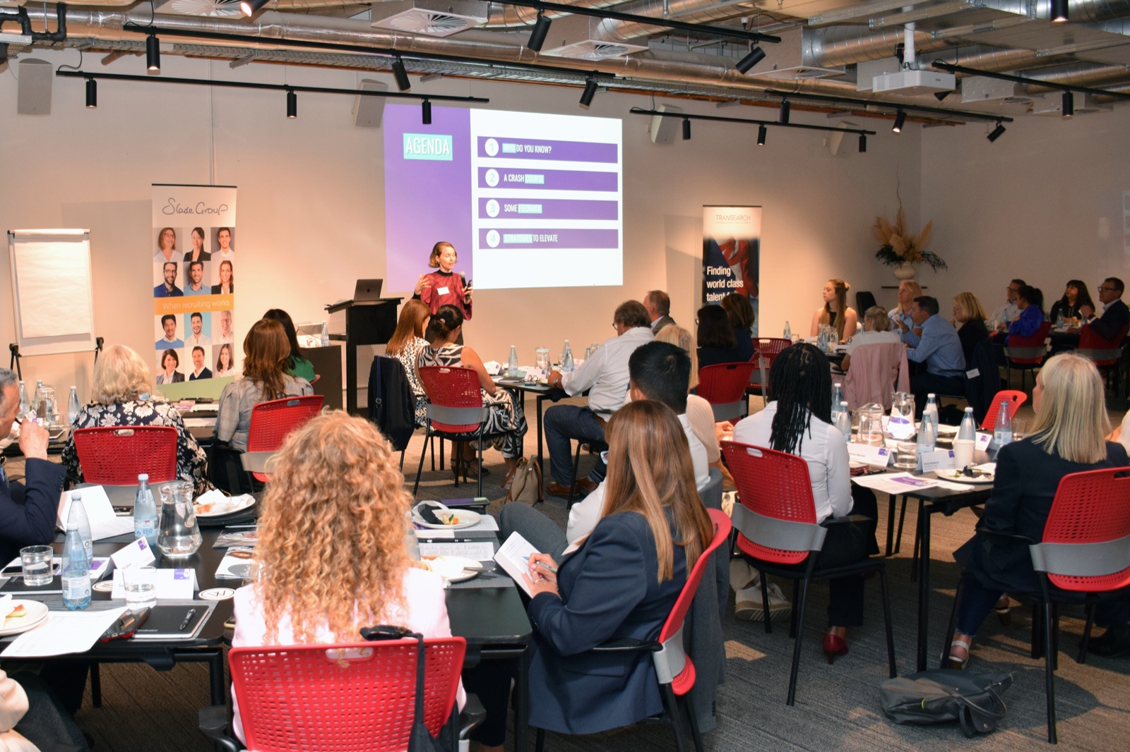Michelle Rushton presenting to an executive team